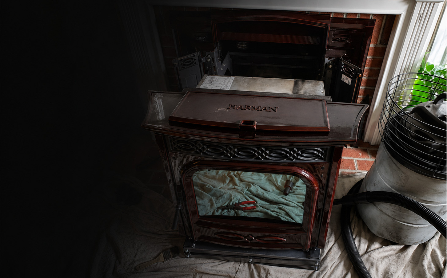 Harman pellet stove during professional service